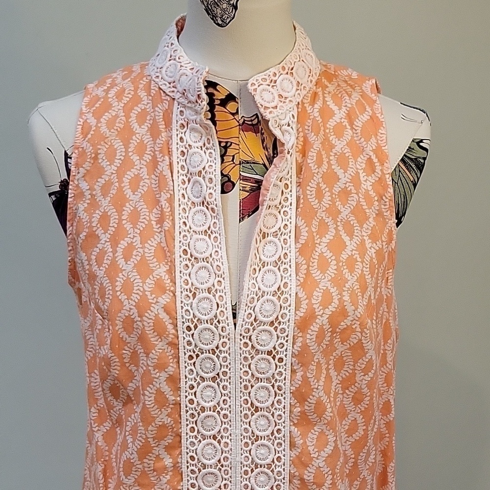 rock flower paper orange & white sleeveless tunic. Size is Large. 100% cotton.